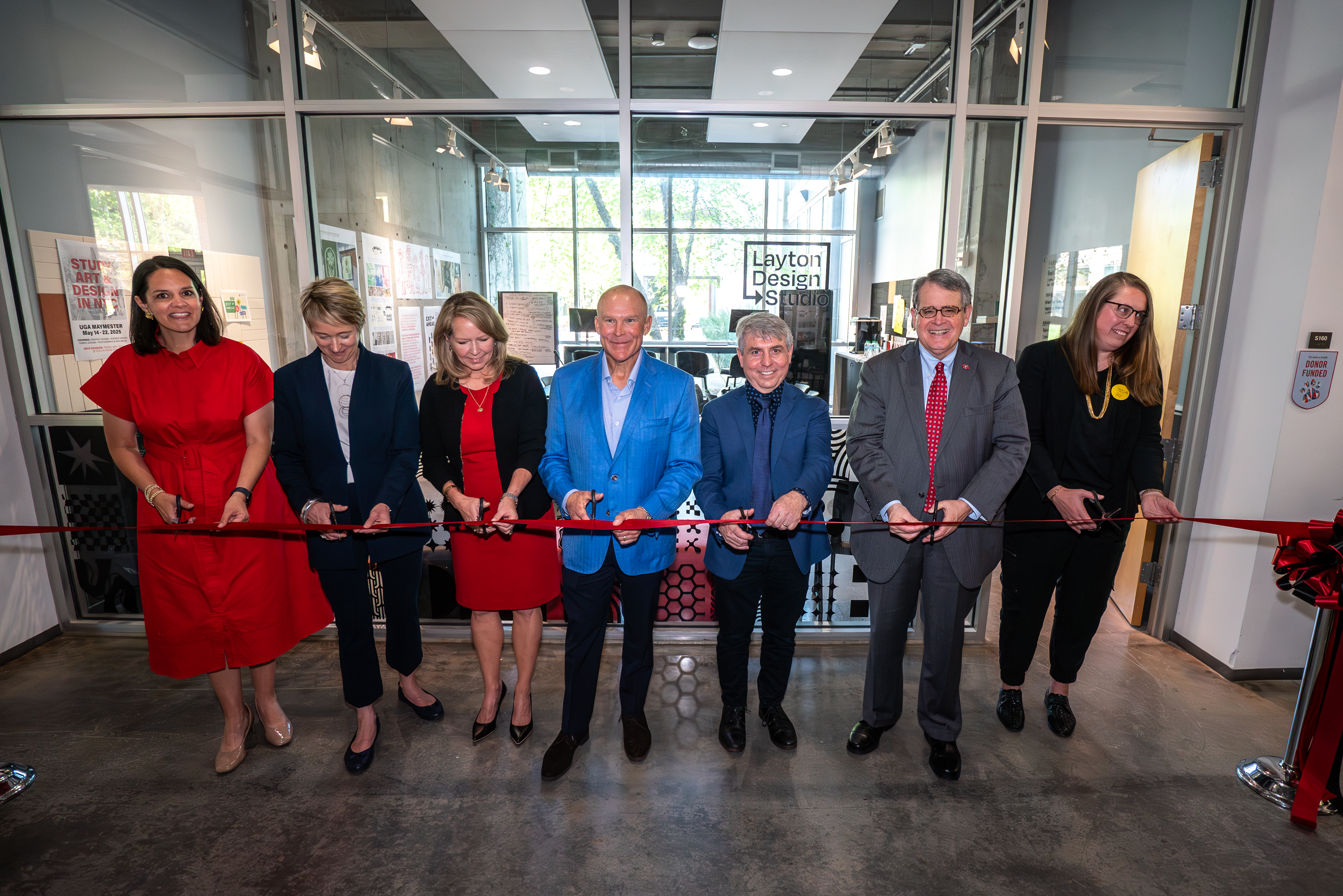 Pictured: Vice President Jill Walton, Dean Anna Stenport, Kelly Layton, Brent Layton, School of Art Director Joe Peragine, President Jere W. Morehead, and Layton Design Studio Director Lindsey Camelio at ribbon cutting ceremony