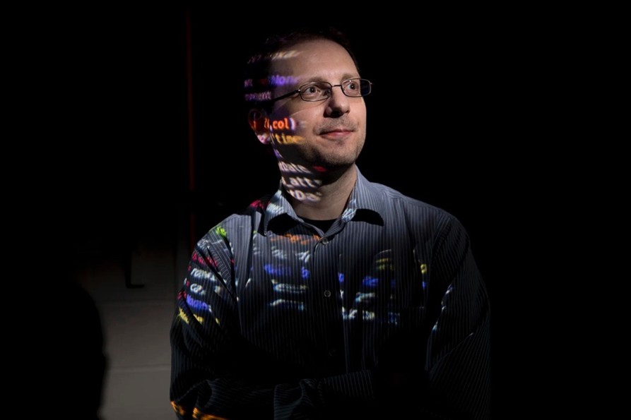 Man looking toward light