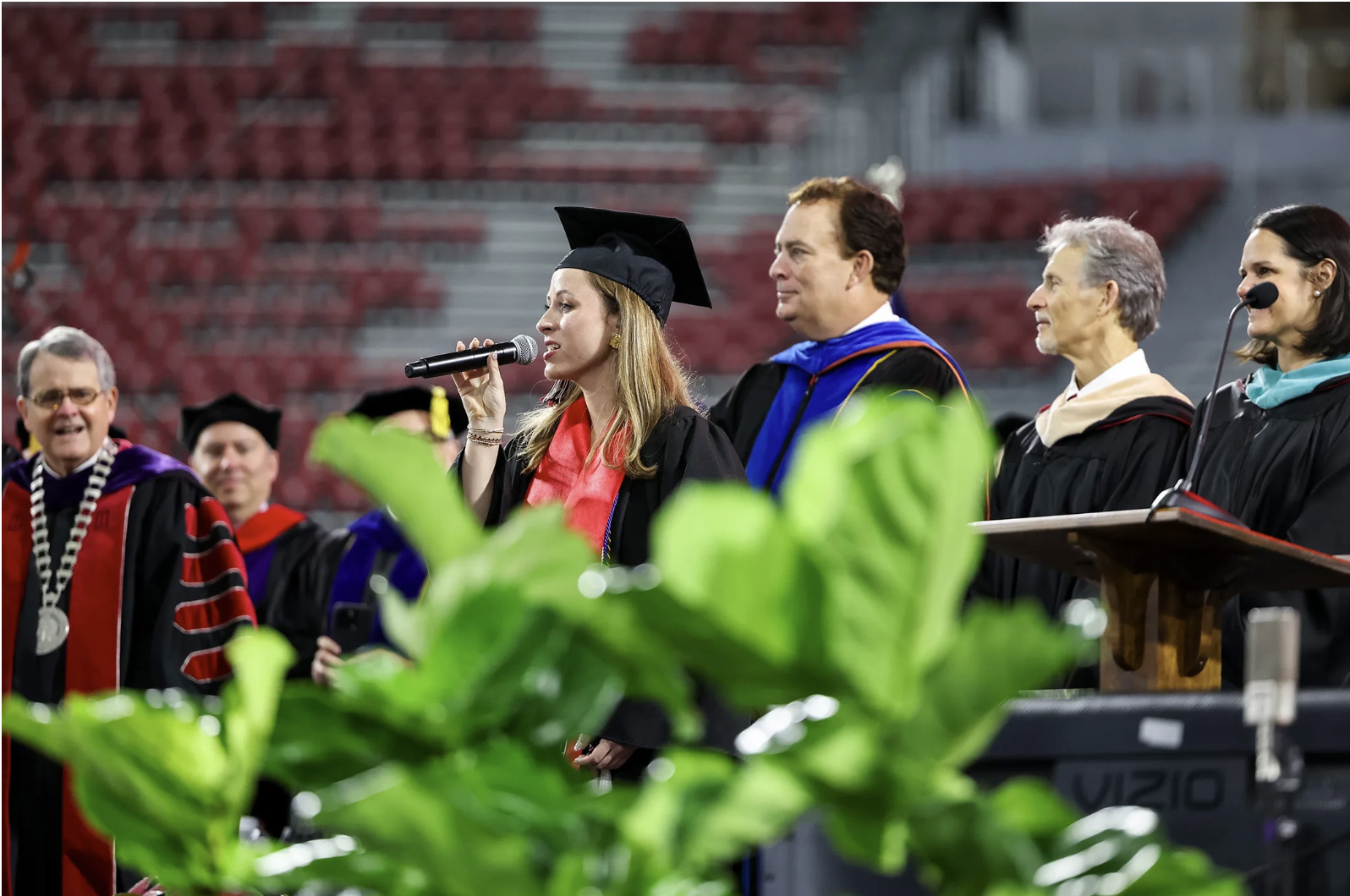 Marianna Baccus singing on stage at Commencement
