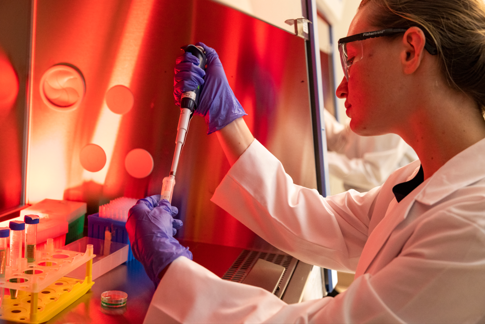 Student working with scientific equipment