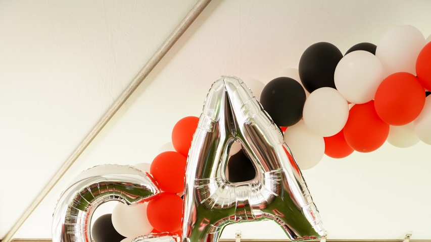 Photo of three people, with props