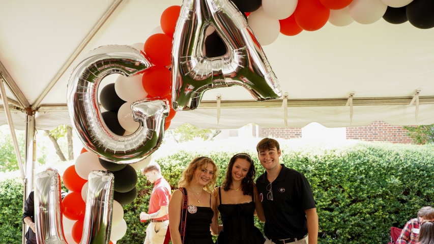 Photo of three people