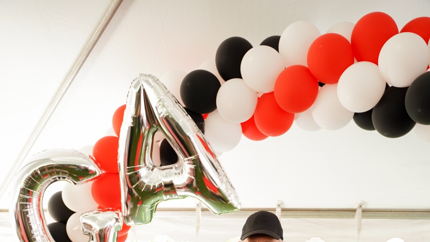 photo of two people with props