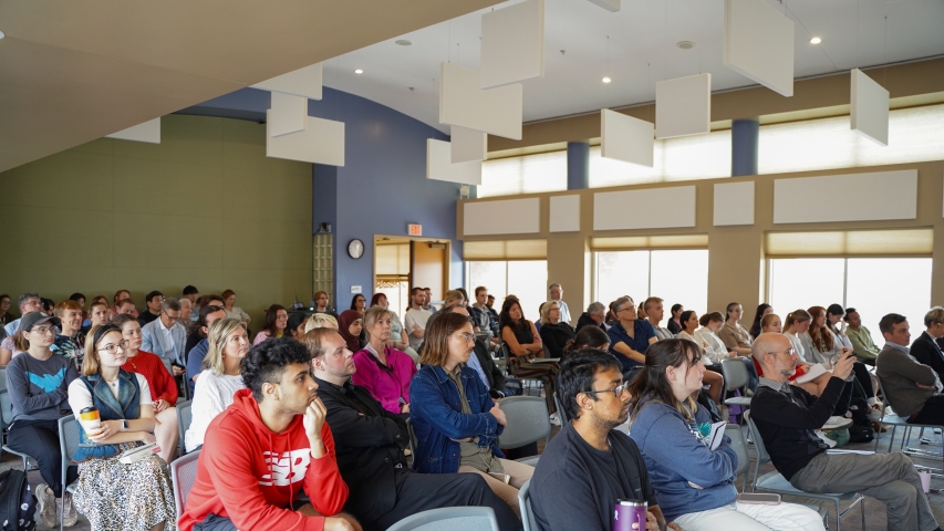 photo of people seated in lecture hall