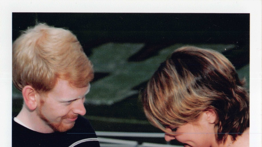 photo of man and woman with ring