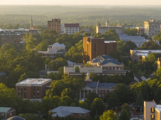 aerial photo of buildings and trees, day