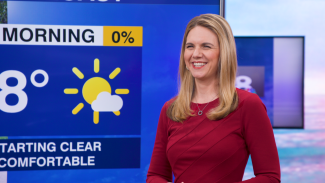 screenshot photo of woman with weather graphic in background