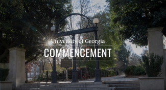photo of arch in sunlight with white letter graphic