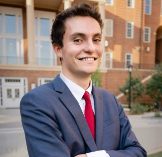 photo of man, building in background day