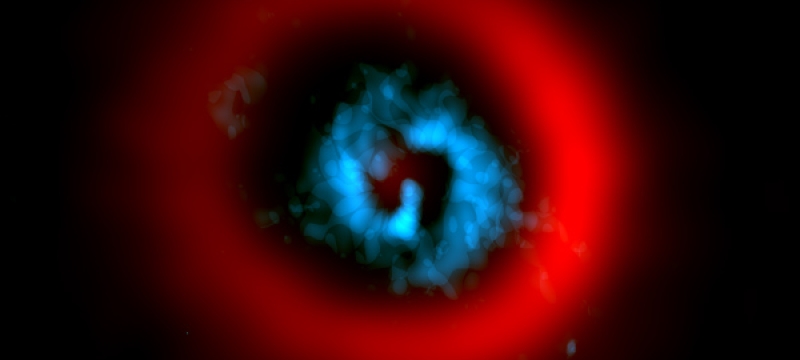 telescope image with red ring and blue center in dark space