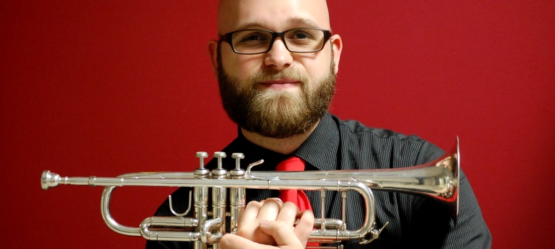 photo of man with trumpet