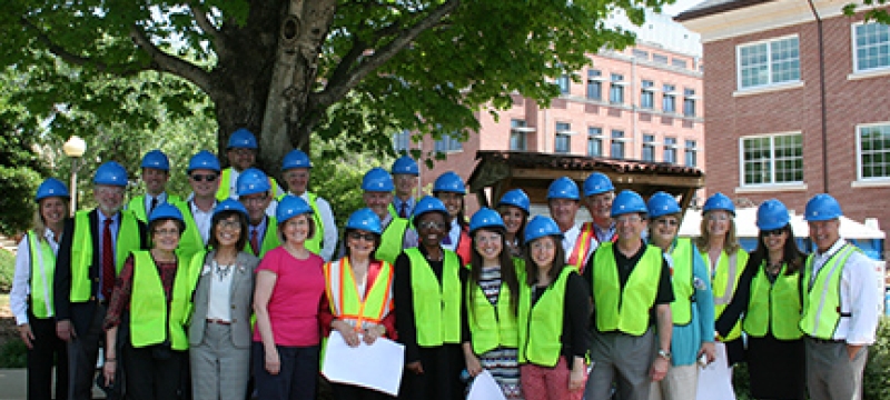 people in hard hats outdoors