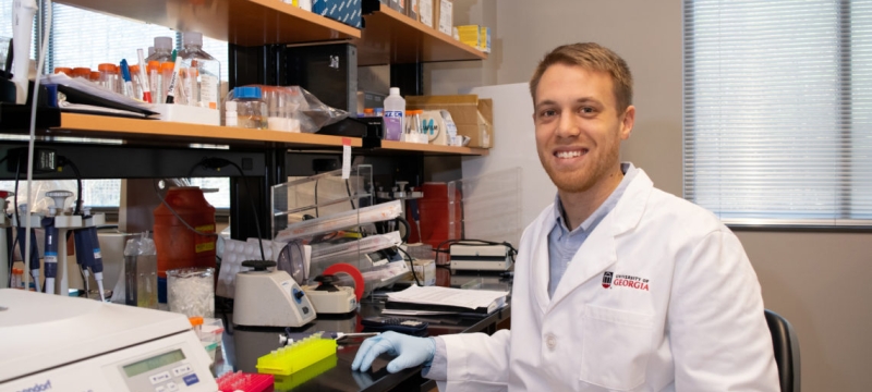 Photo of man in lab/office