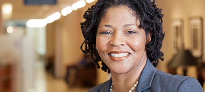 women in hospital hallway