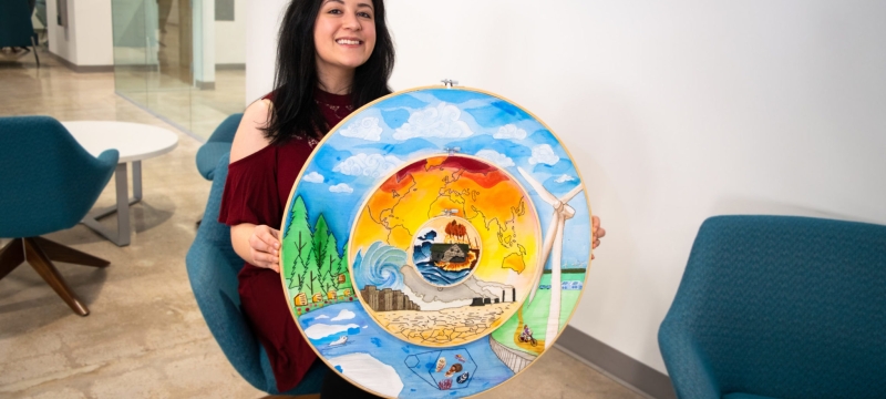 photo of woman with artwork