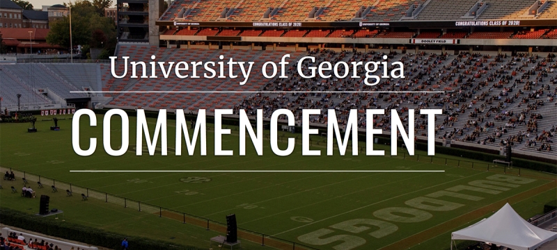 photo of stadium at twilight, with white letters