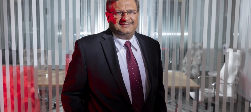 photo of man in office corridor