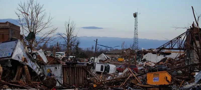 photo of damaged buildings and debris, day