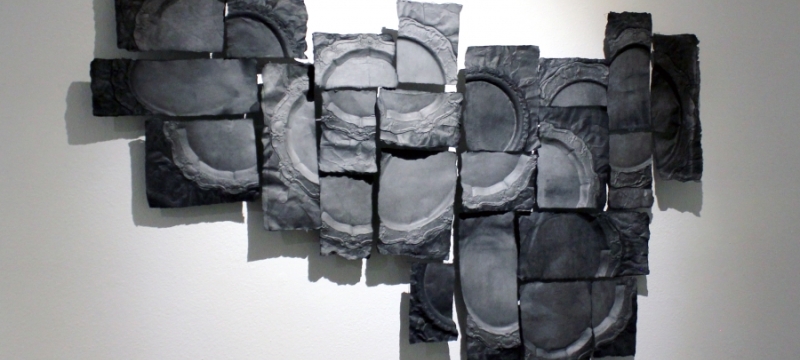 photo of paper, ink, and thread collage