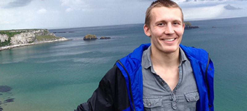 man next to sea view