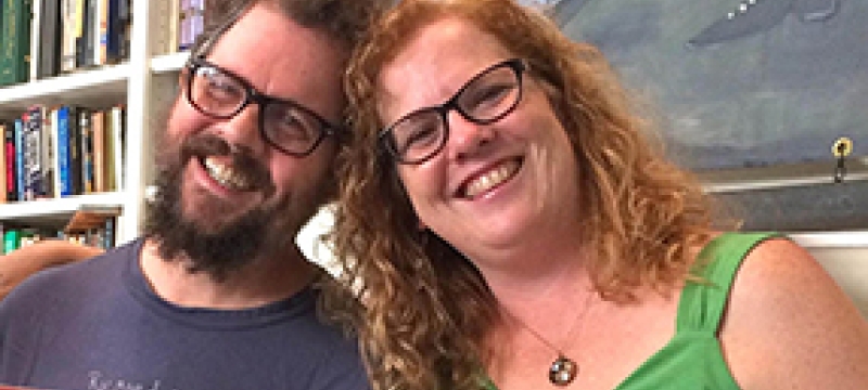 man and woman smiling