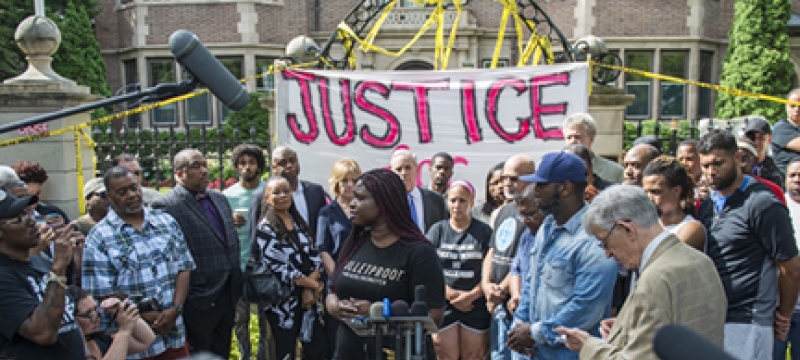 woman surrounded with microphones