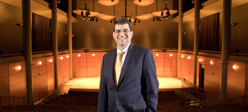 photo of man in performance hall