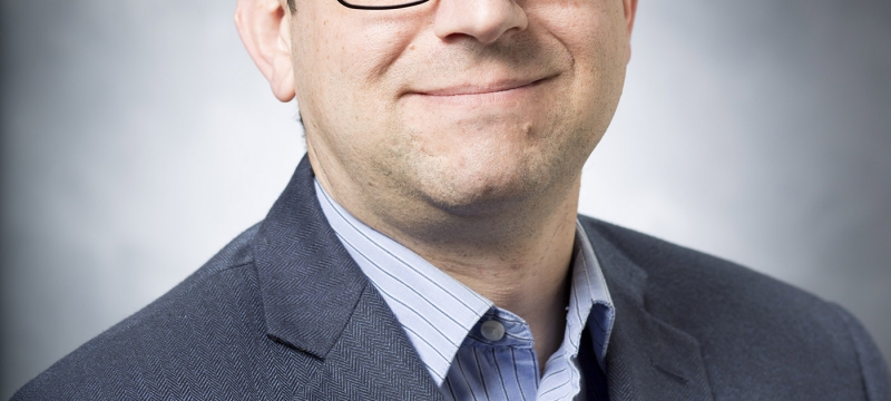 studio headshot of man