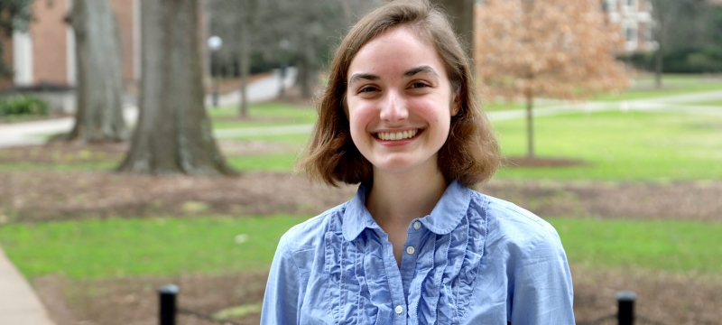 photo of woman, campus scene