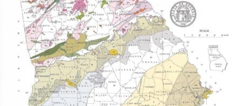 graphic map of Georgia with belts of mineral deposits in different colors