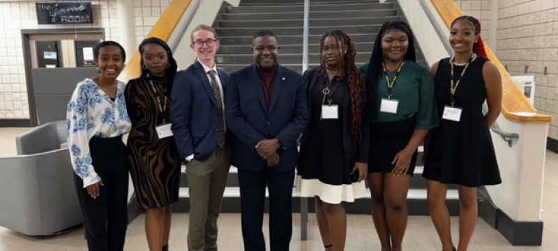 photo of six people, stars in background