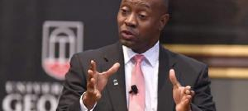 photo of man speaking, gesturing