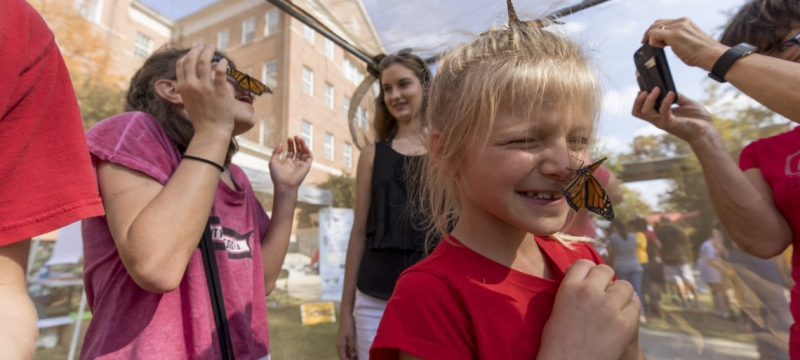 photo of children with butterflies