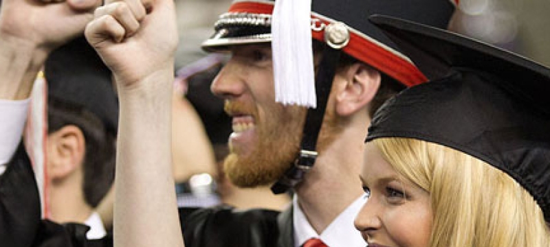 man and woman graduating