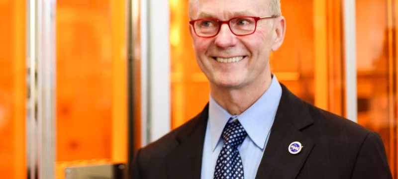 photo of man next to clean room facility 