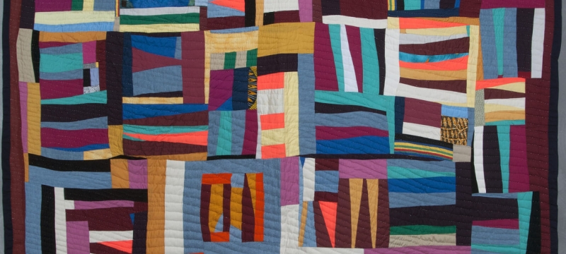 photo of a multi-colored quilt