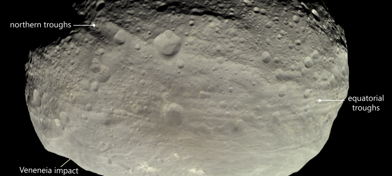 photo of asteroid in space, with labeling text