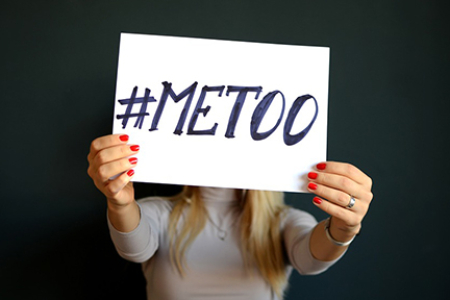 photo of woman with Me Too sign