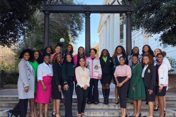 photo of woman at arch, day