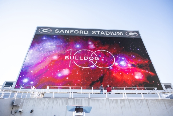 photo of stadium Jumbotron with Bulldog 100 graphic