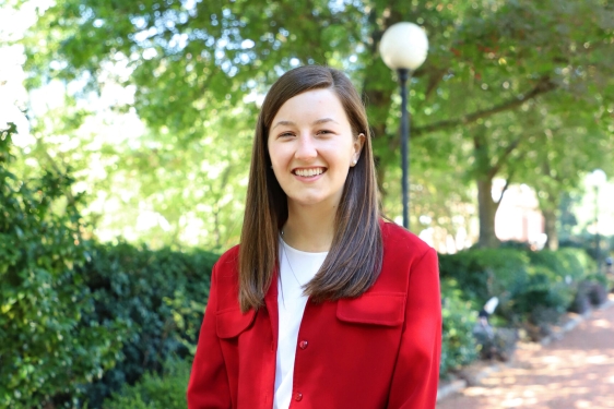 photo of woman outdoors on sidewalk