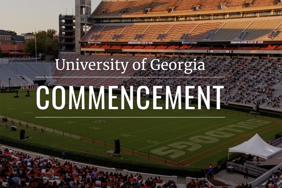 photo of stadium at twilight, with white letters