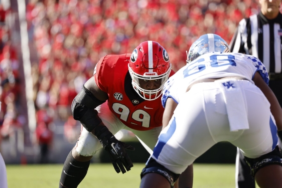 photo of football players in game