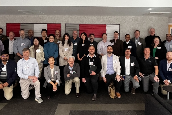 group photo of many people, indoors