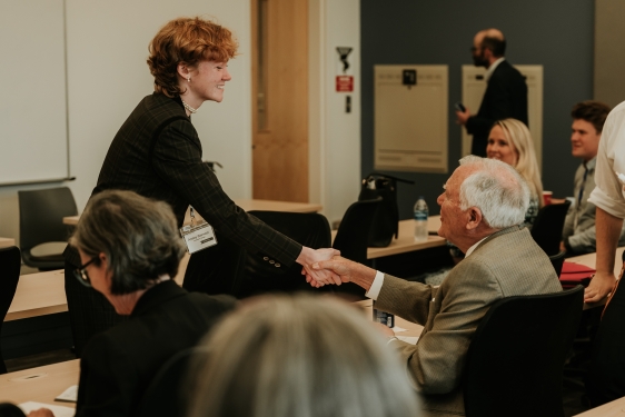 photo off woman sharing hands with man