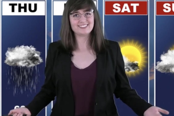 photo of woman in TV weather center