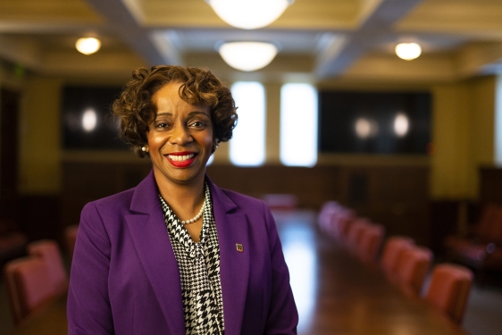 photo of woman in board room