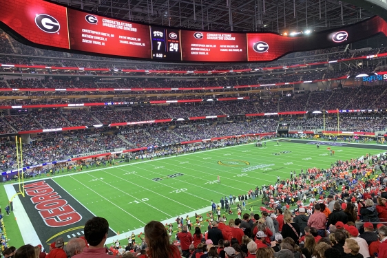 photo of stadium, people during sporting event