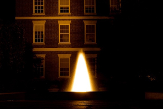 buildings with fountain and light, night