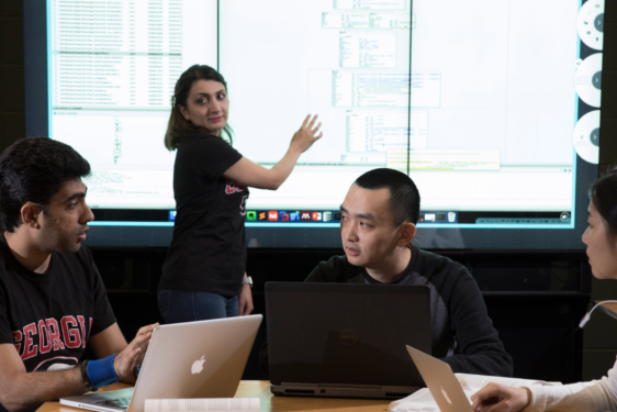 photo of people with screen background